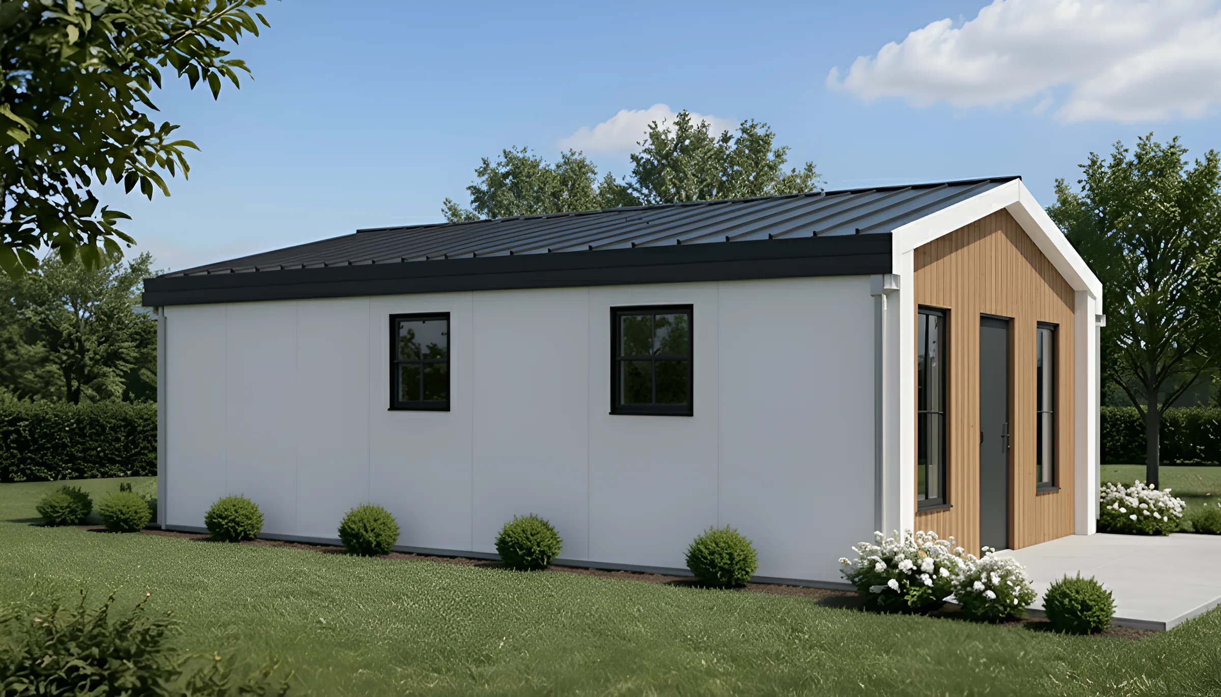 Backyard ADU side elevation with white panels, wood entry, black roof, and landscaped yard.